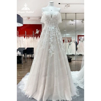 קלאסי קו מתוקה הכלה מסיבת חתונה שמלות 2023 שרוולים רכבת לטאטא טיפה כתף תחרה לבן שנהב שמלת כלה.
